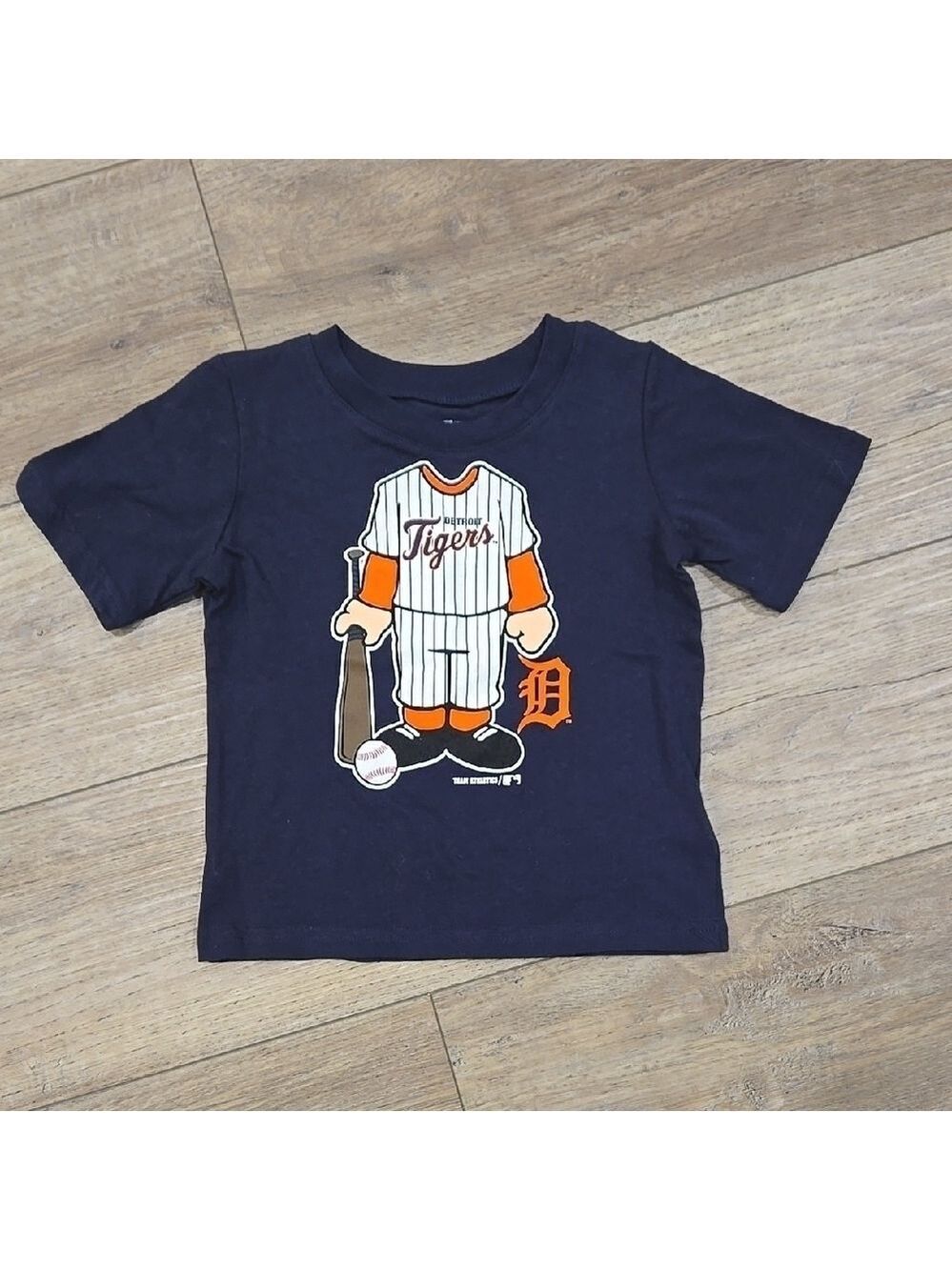 Genuine Merchandise Blue and Orange Short Sleeve Tee with Baseball Design